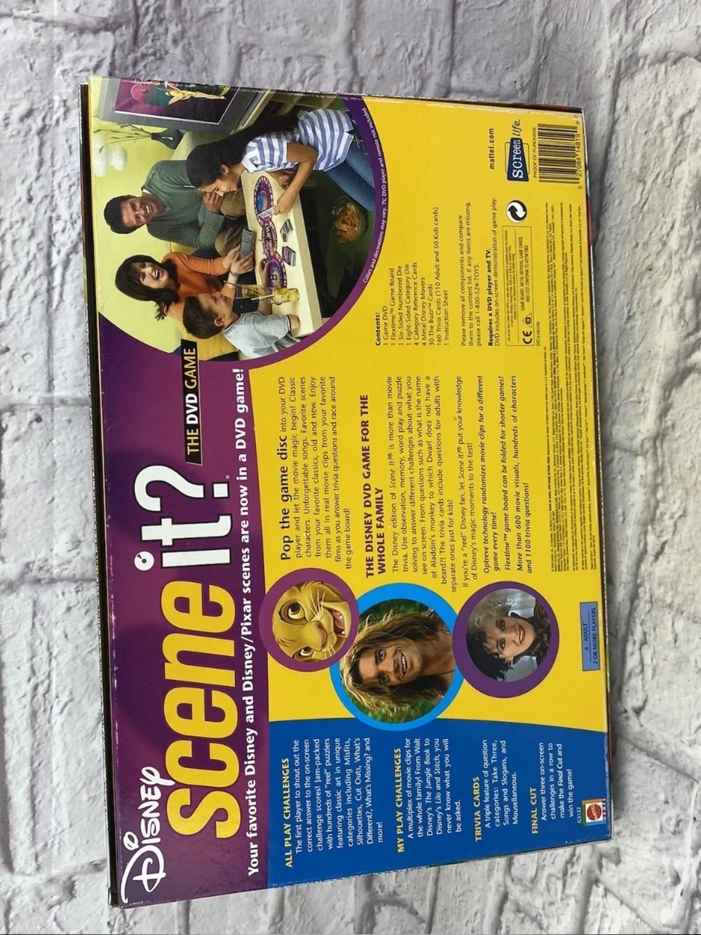 Disney Spin It? DVD Game — Purple and Yellow Box with Colorful Character Art